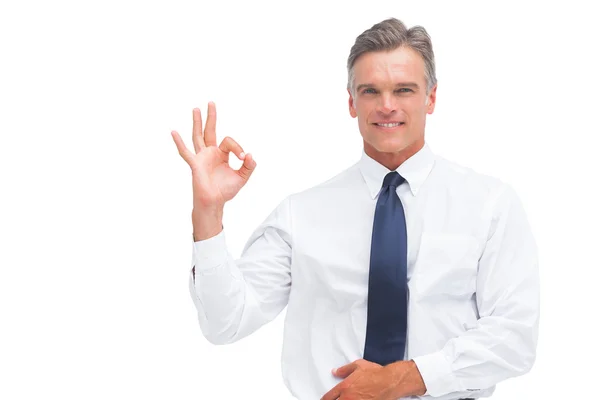 Mature businessman saying ok with hand — Stock Photo, Image