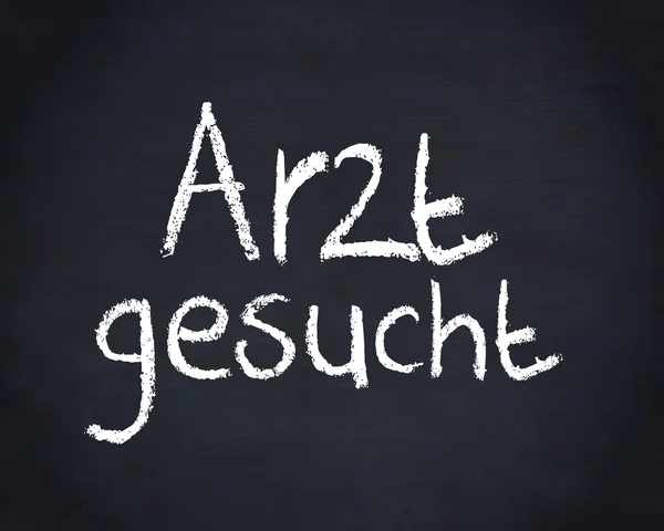 German word arzt gesucht written on a blackboard — Stock Photo, Image