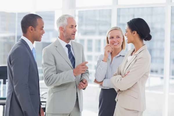 Happy business team talking — Stock Photo, Image