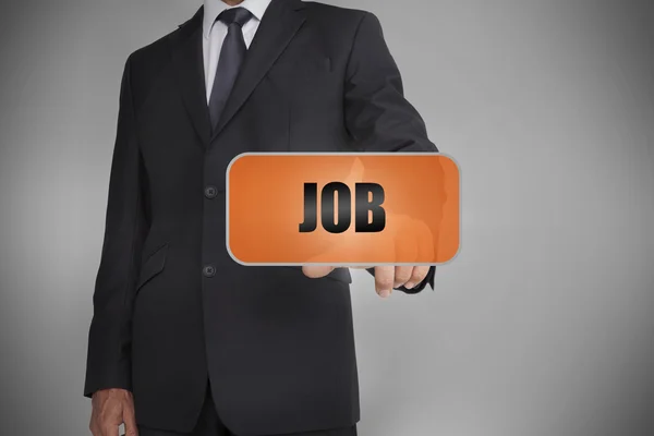 Businessman touching orange tag with the word job written on it — Stock Photo, Image