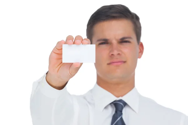 Businessman showing a white blank business card — Stock Photo, Image