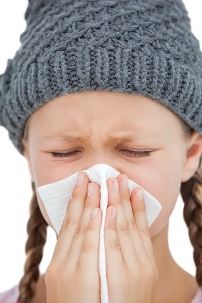 Sick little girl with an handkerchief with eyes closed — Stock Photo, Image