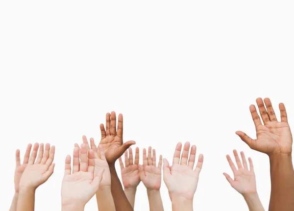 Hands raising in the air — Stock Photo, Image
