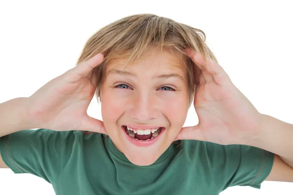 Ragazzo stupito sorridente con le mani alzate — Foto Stock