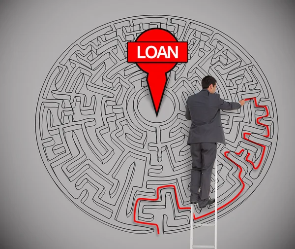 Businessman trying to find a loan in a maze — Stock Photo, Image