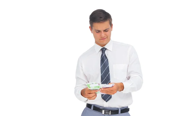 Businessman counting cash — Stock Photo, Image