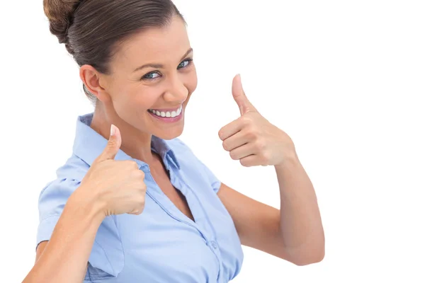 Smiling businesswoman with thumbs up — Stock Photo, Image
