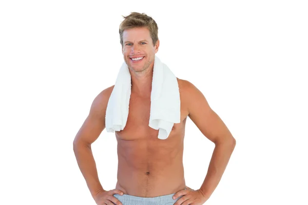 Shirtless man standing with hands on hips — Stock Photo, Image