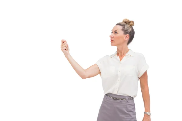 Businesswoman holding her hand up and looking up Royalty Free Stock Photos