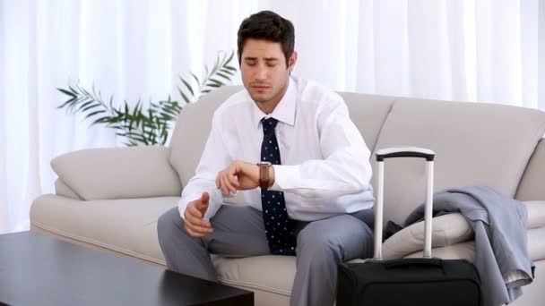 Attractive businessman watching his watch — Stock Video