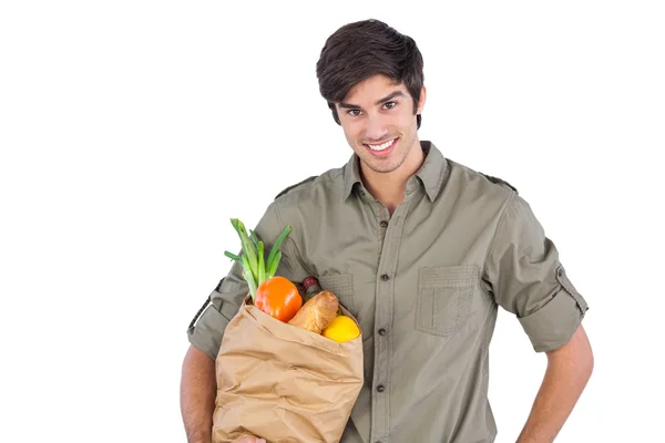 Jovem com saco de compras — Fotografia de Stock