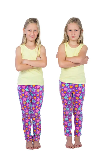 Sisters with arms crossed — Stock Photo, Image