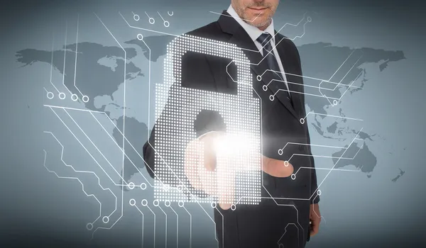 Businessman selecting a white padlock — Stock Photo, Image