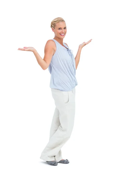 Happy woman standing with hands up — Stock Photo, Image