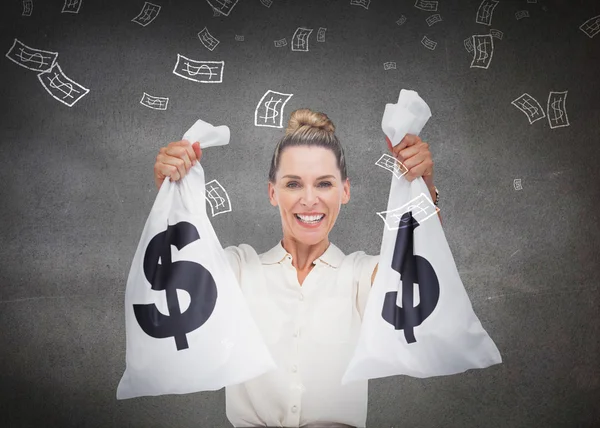 Businesswoman holding cash bags — Stock Photo, Image