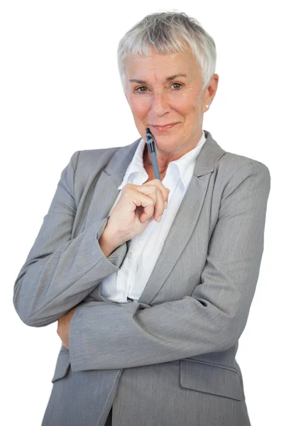 Mulher de negócios alegre segurando caneta — Fotografia de Stock