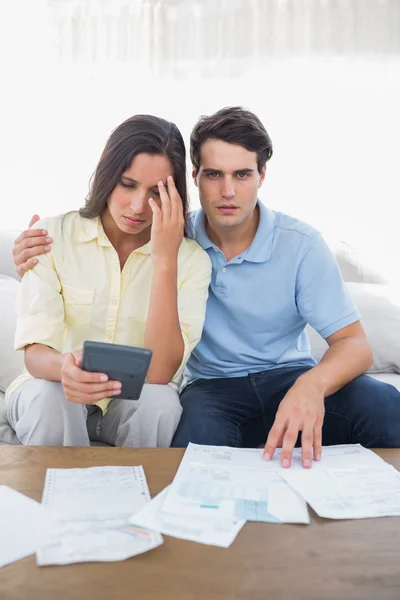 Stressed couple doing their accounts — Stock Photo, Image