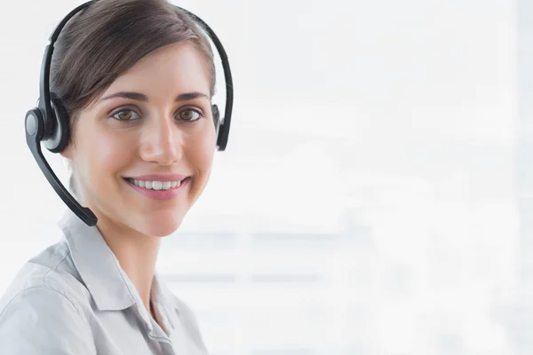 Call centre agent smiling at camera — Stock Photo, Image