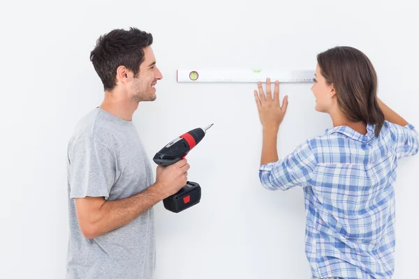 Man and his wife doing diy together — Stock Photo, Image