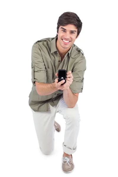 Young man making a marriage proposal — Stock Photo, Image