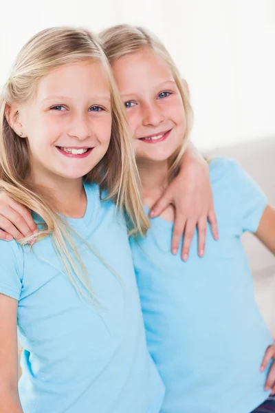 Cute twins embracing each other — Stock Photo, Image