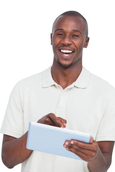 Portrait of a laughing man with tablet pc — Stock Photo, Image
