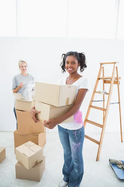 Young housemates moving into new home — Stock Photo, Image