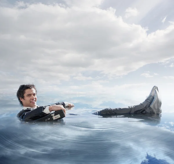 Businessman in the water — Stock Photo, Image