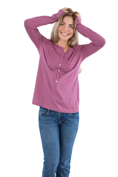 Happy woman with hands on head — Stock Photo, Image