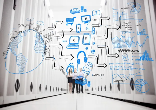 Colleagues in a data center standing in front of drawings — Stock Photo, Image