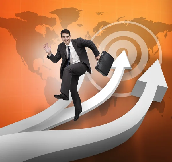 Businessman jumping over arrows and world map — Stock Photo, Image