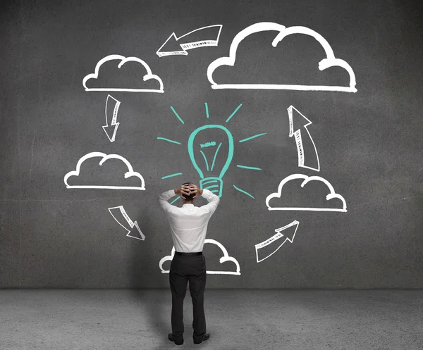 Stressed man looking at a process — Stock Photo, Image