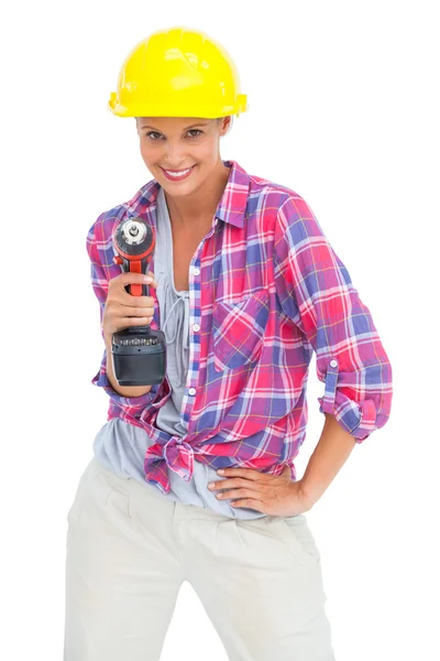 Sorrindo mulher útil com uma broca de energia — Fotografia de Stock