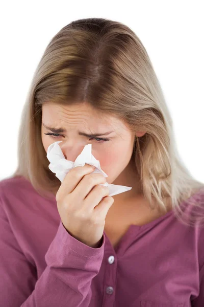 Portrait of woman blowing her nose — Stock Photo, Image