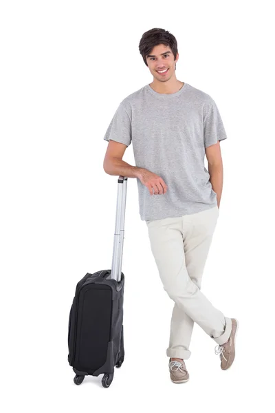 Стоящий человек со своим чемоданом — стоковое фото