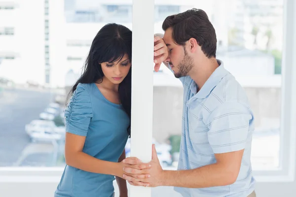 Divided couple are separated by white wall — Stock Photo, Image