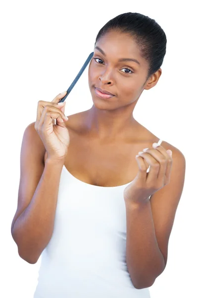 Young woman holding nail file — Stock Photo, Image