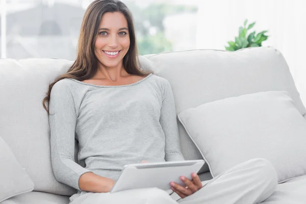 Beautiful woman using a tablet — Stock Photo, Image