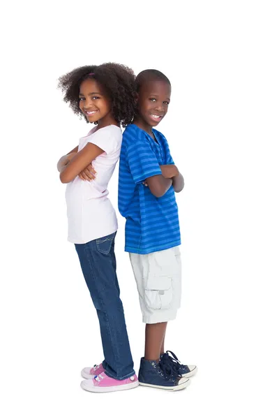 Brother and sister back to back — Stock Photo, Image