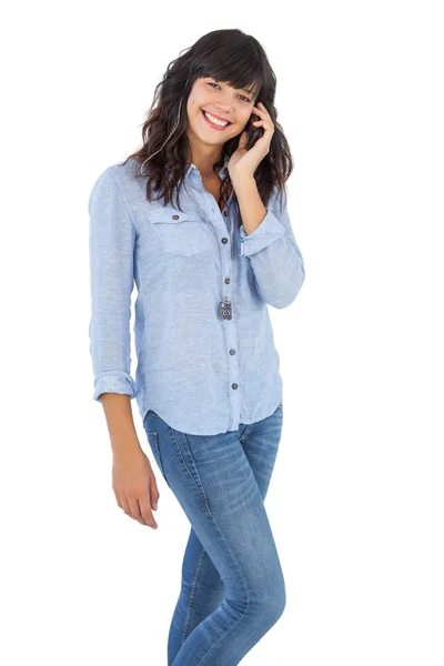 Cheerful brunette with her mobile phone calling someone — Stock Photo, Image