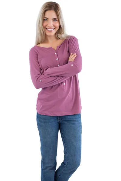 Smiling woman with arms crossed Stock Image