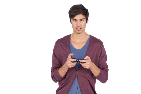 Młody człowiek koncentruje się na gry wideo — Zdjęcie stockowe