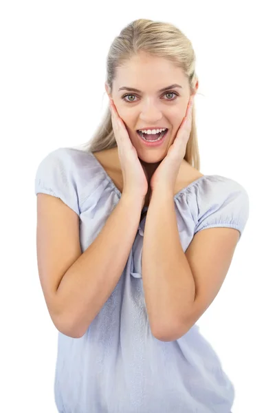 Smiling blonde woman is surprised — Stock Photo, Image