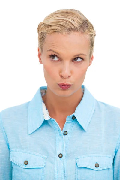 Serious blonde looking up — Stock Photo, Image