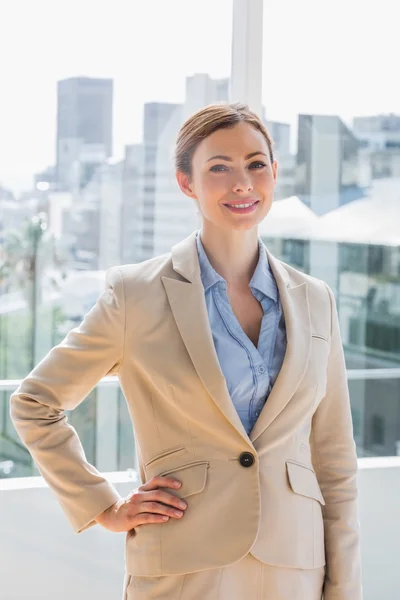 Pretty businesswoman smiling at camera — Stock Photo, Image