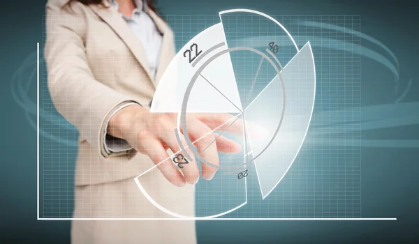 Businesswoman touching futuristic pie chart interface — Stock Photo, Image