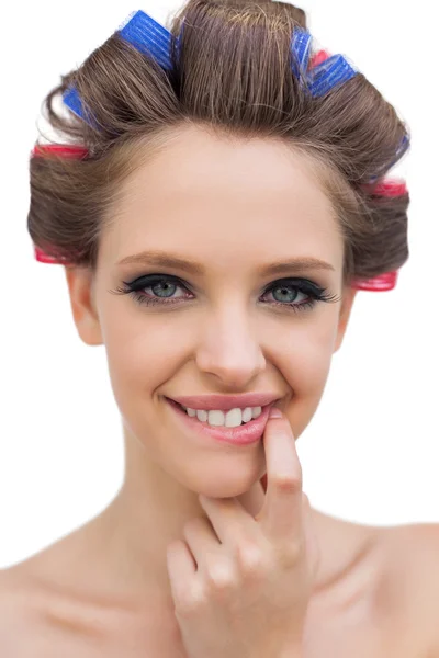 Portrait of young model with hair curlers — Stock Photo, Image