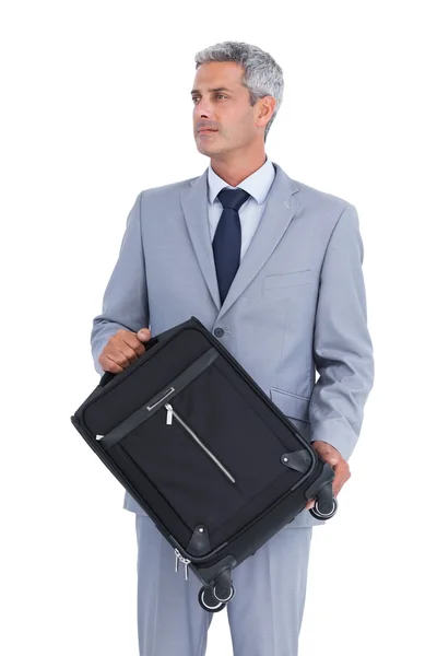 Beau homme d'affaires portant une valise — Photo