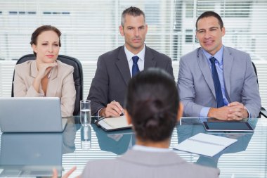Business team listening to the applicant in interview clipart
