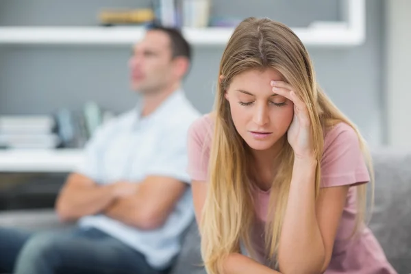 Couple not speaking after an argument on the couch — Stock Photo, Image